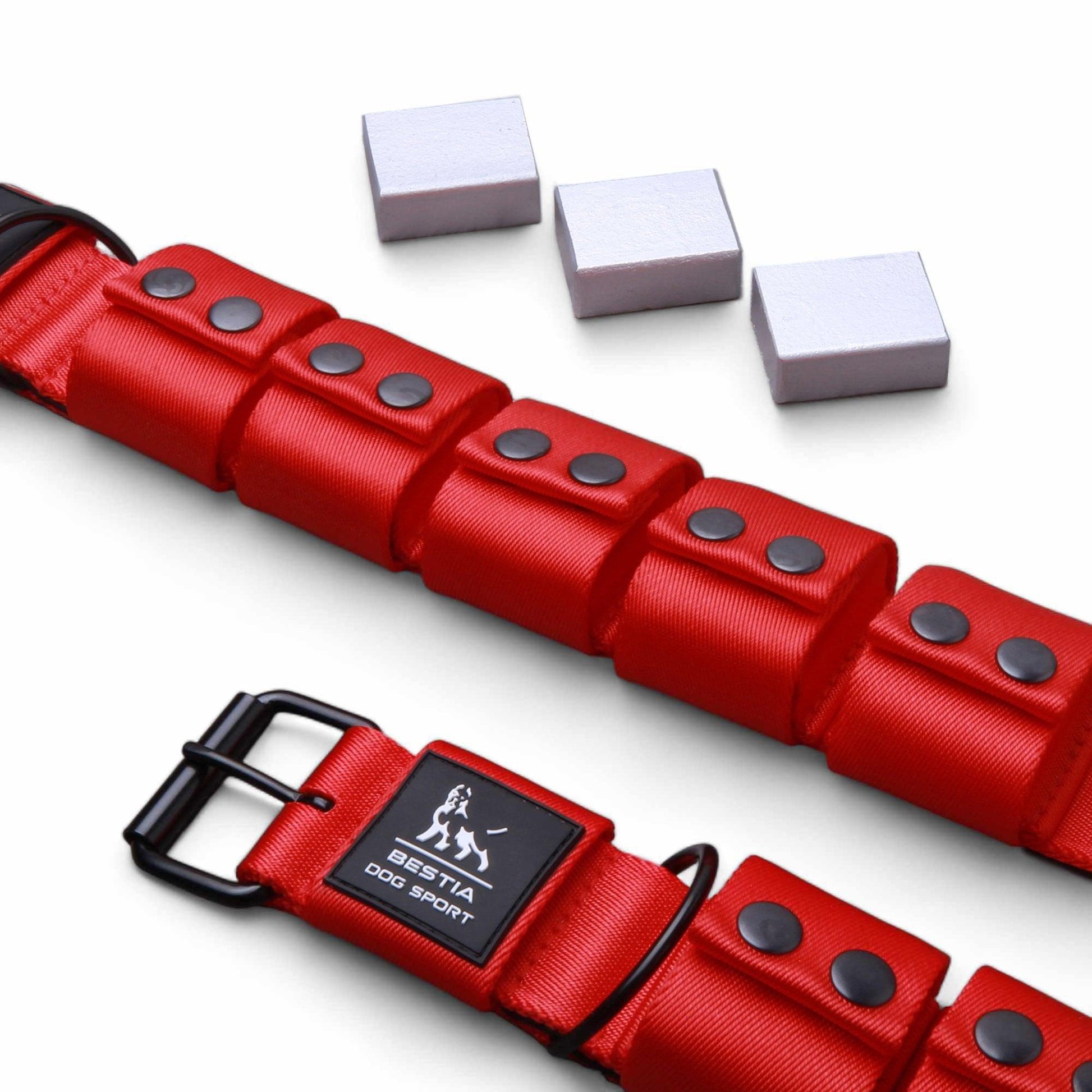 Weighted dog training collar in red with removable weights on white background