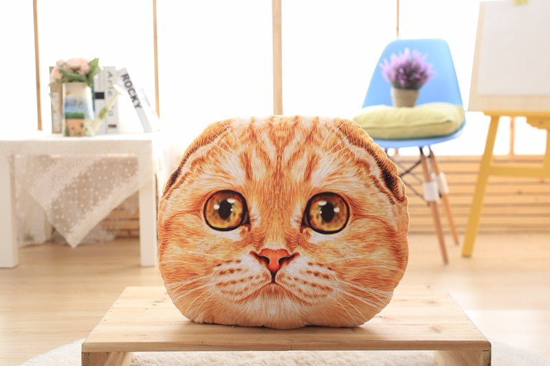 Cat face pillow on a wooden table in a room with chairs and decor