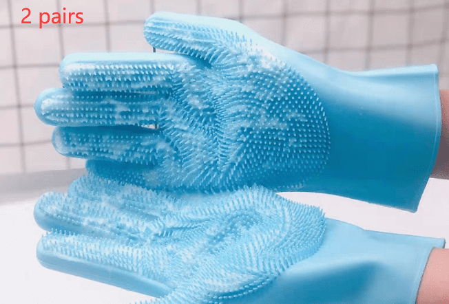 Blue grooming gloves with textured surface on a white background